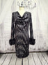 Black knit and silver sequin dress with feather cuffs