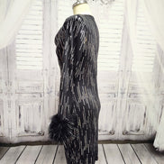 Black knit and silver sequin dress with feather cuffs